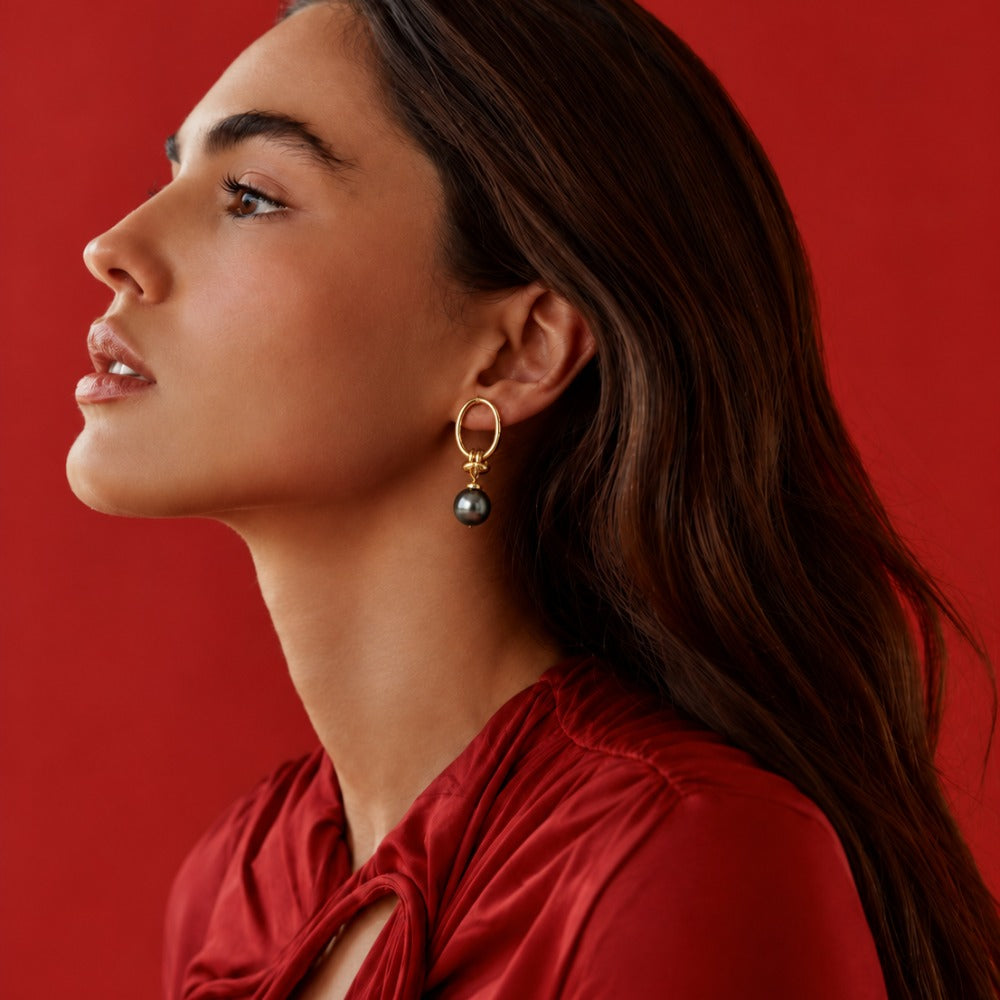 Woman wearing the gold filled Nirvana Earrings