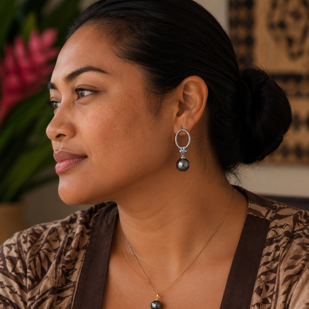 Woman wearing the silver filled Nirvana Earrings