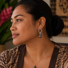 Woman wearing the silver filled Nirvana Earrings